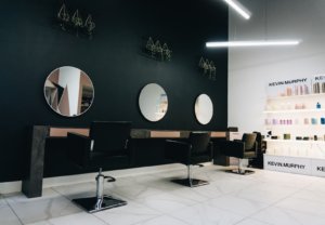 hair four salon chairs facing mirrors