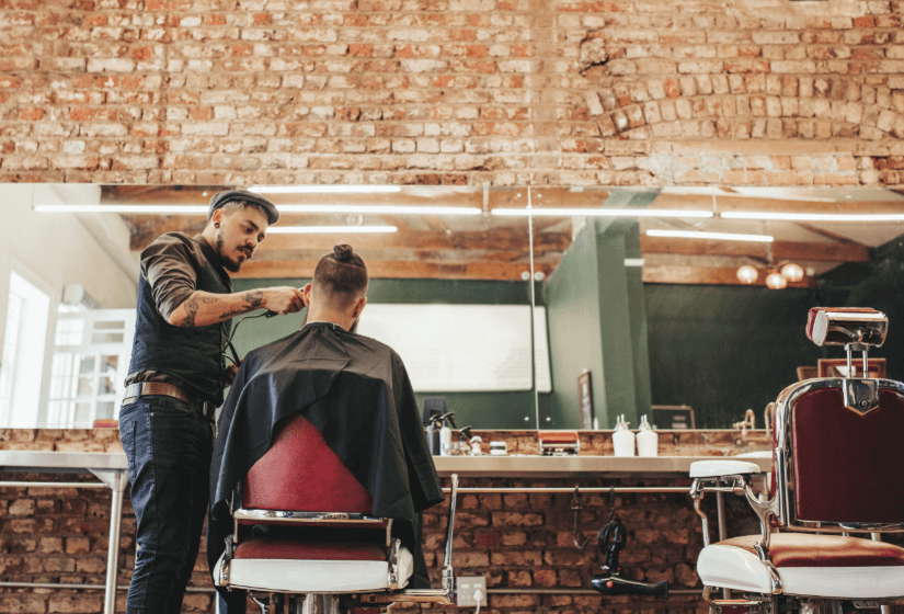 man cutting hair in a barbershop