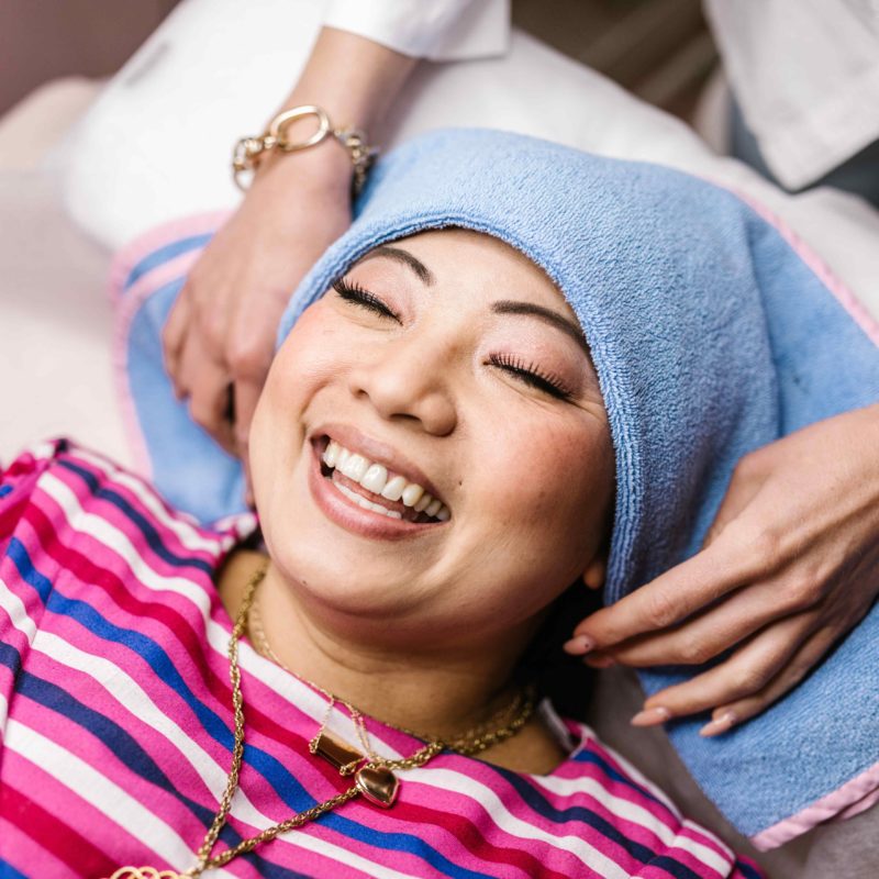 customer smiling in beauty salon